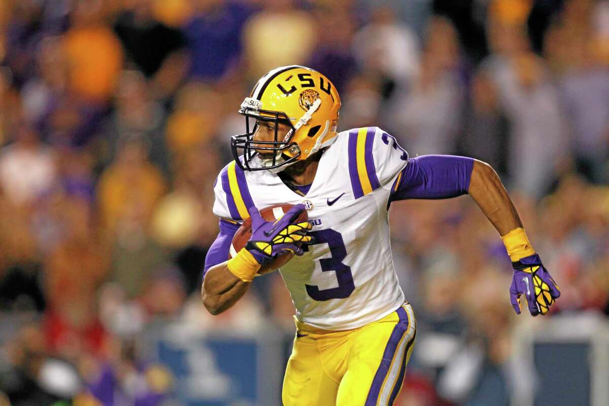 In this Nov. 17, 2012, file photo, LSU wide receiver Odell Beckham returns a punt 89 yards for a touchdown against Mississippi in Baton Rouge, La.