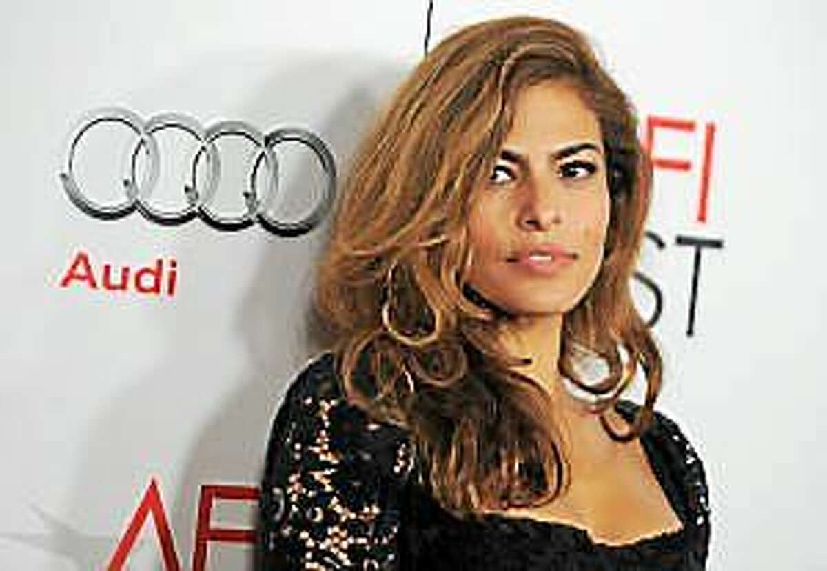 Eva Mendes arrives at the “On The Road” gala screening as part of AFI Fest on Saturday, November 3, 2012, in Los Angeles.