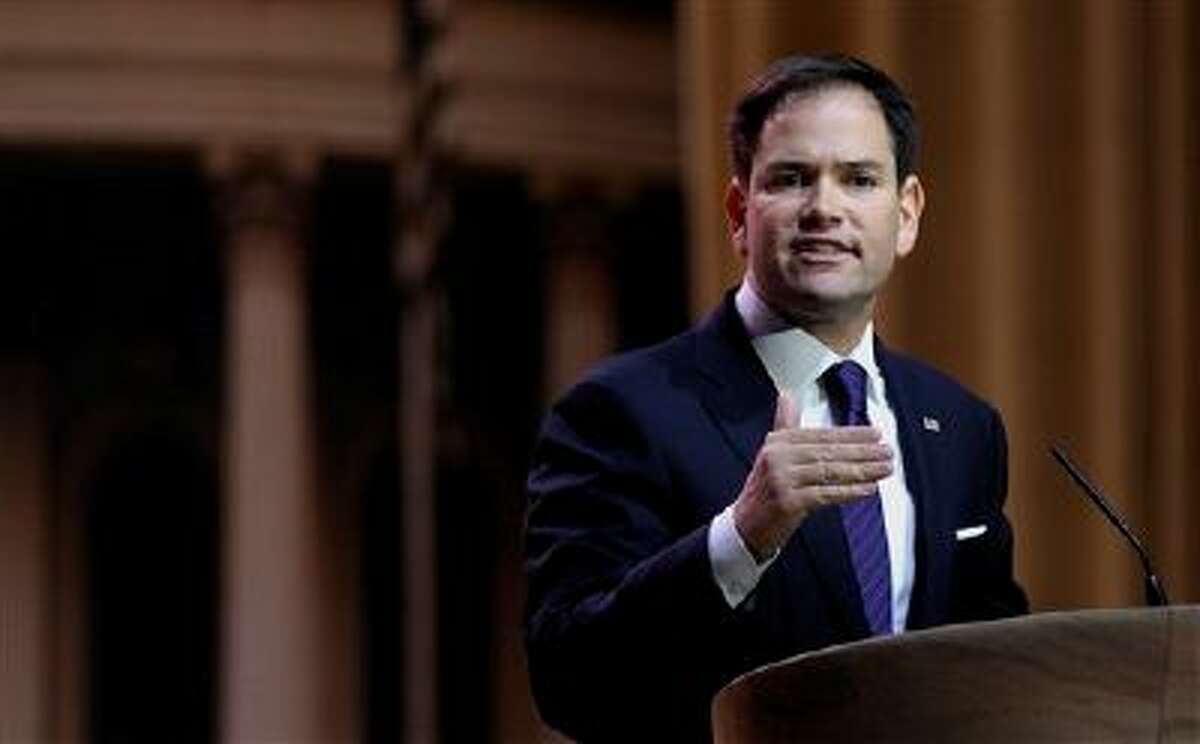 Sen. Marco Rubio, R-Fla. speaks at the Conservative Political Action Committee annual conference in National Harbor, Md., Thursday, March 6, 2014. Rubio said the US is the one nation that can rally people around the globe against the rise of totalitarian governments. (AP Photo/Susan Walsh)