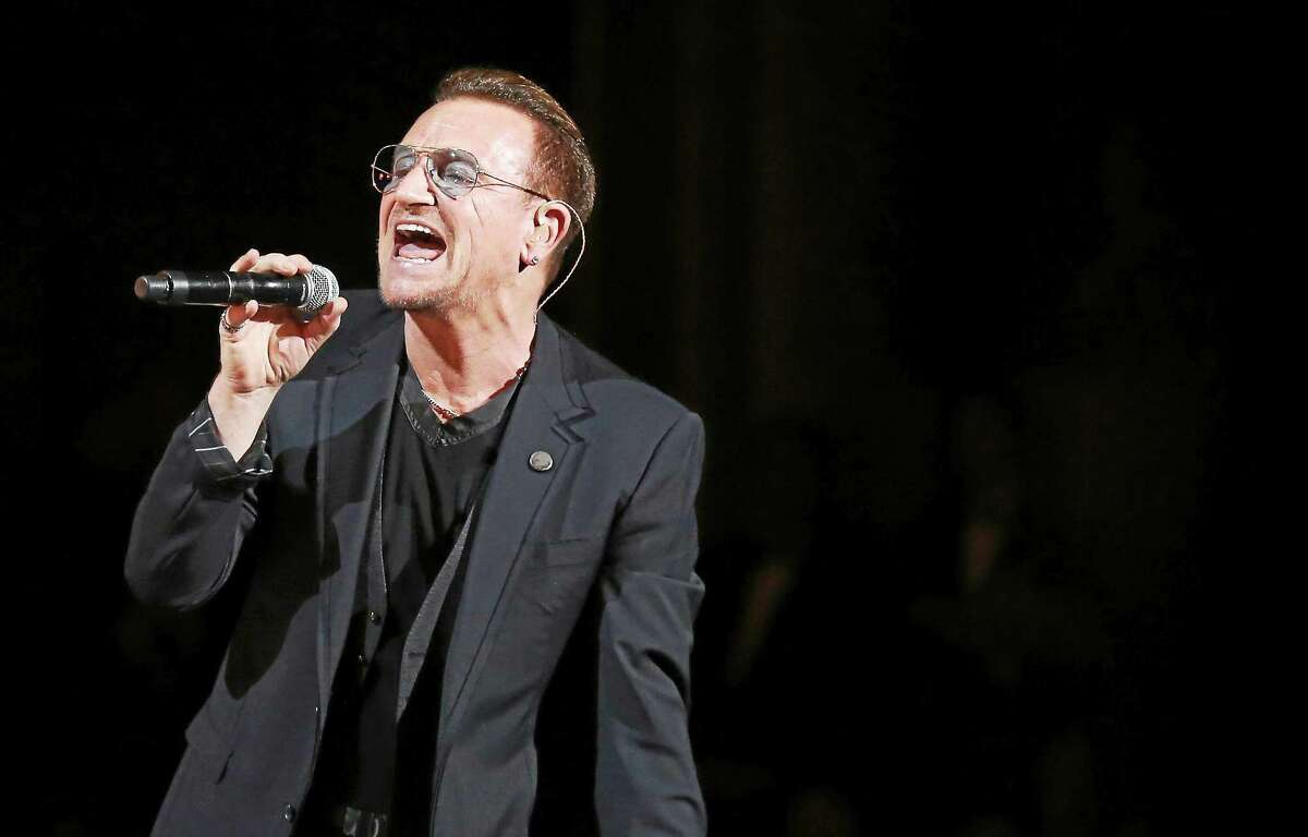 Bono of U2 performs on stage during the Oscars at the Dolby Theatre on March 2, 2014, in Los Angeles.