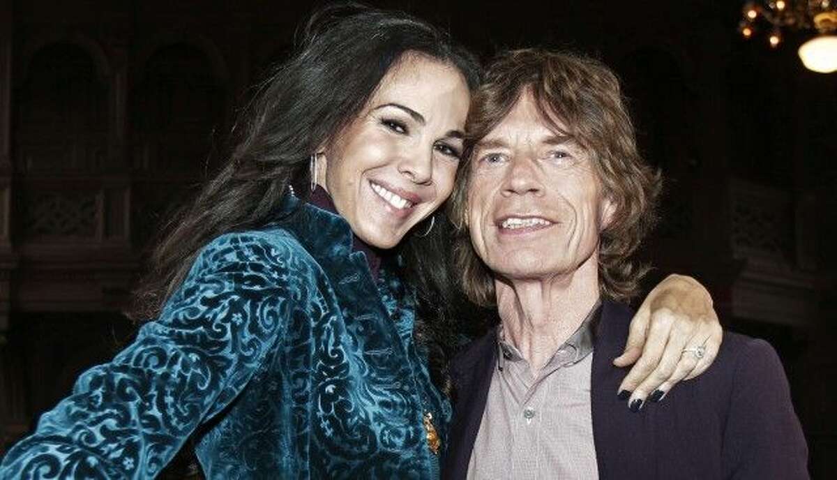 Mick Jagger poses for photos with L’Wren Scott in New York on Feb. 16, 2012.