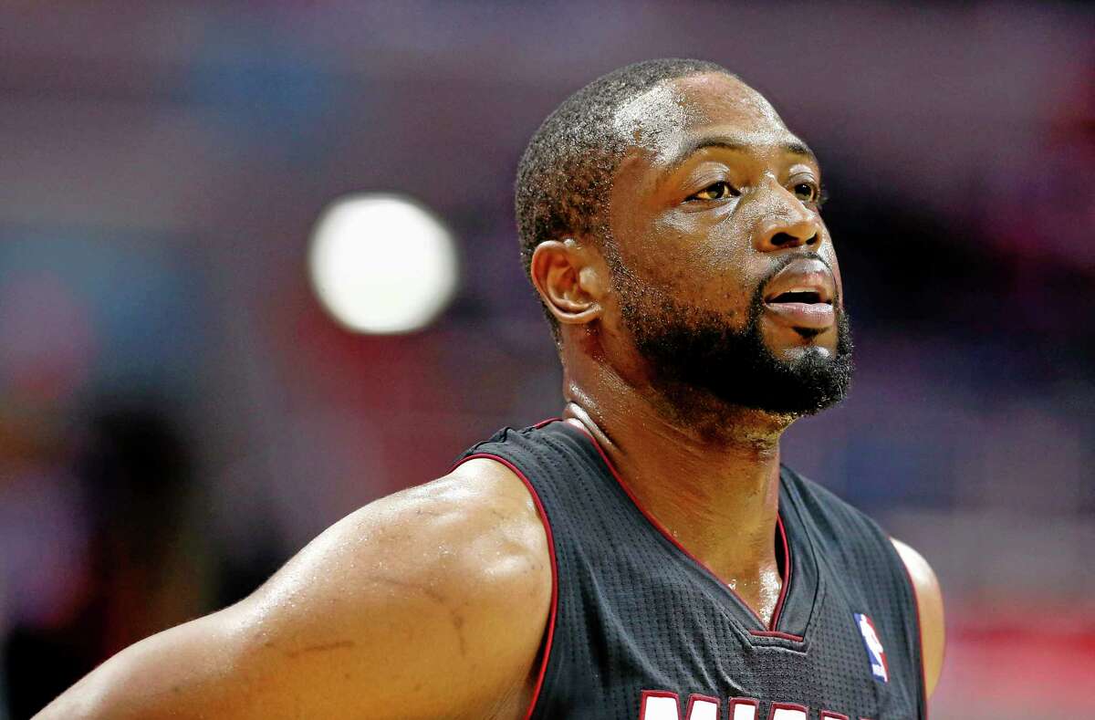 Dwyane Wade is staying with the Heat, agreeing to a two-year deal with a player option for 2015-16. Wade made reference to the deal Tuesday, tweeting “Home Is Where the Heart Is” and calling himself a “HeatLifer” in a photo of him below Miami’s three NBA championship banners.