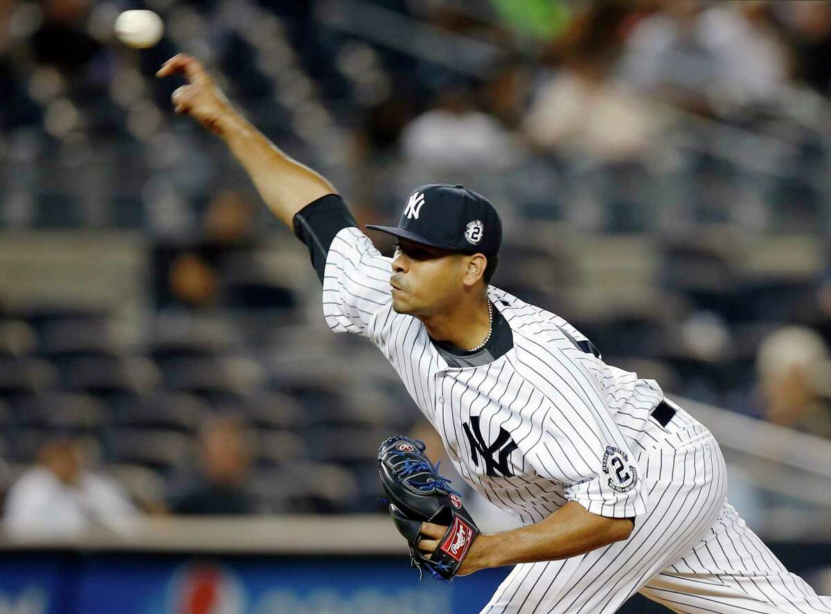 Yankees relief pitcher Esmil Rogers closes out the Yankees’ 8-5 victory over the Tampa Bay Rays on Wednesday.