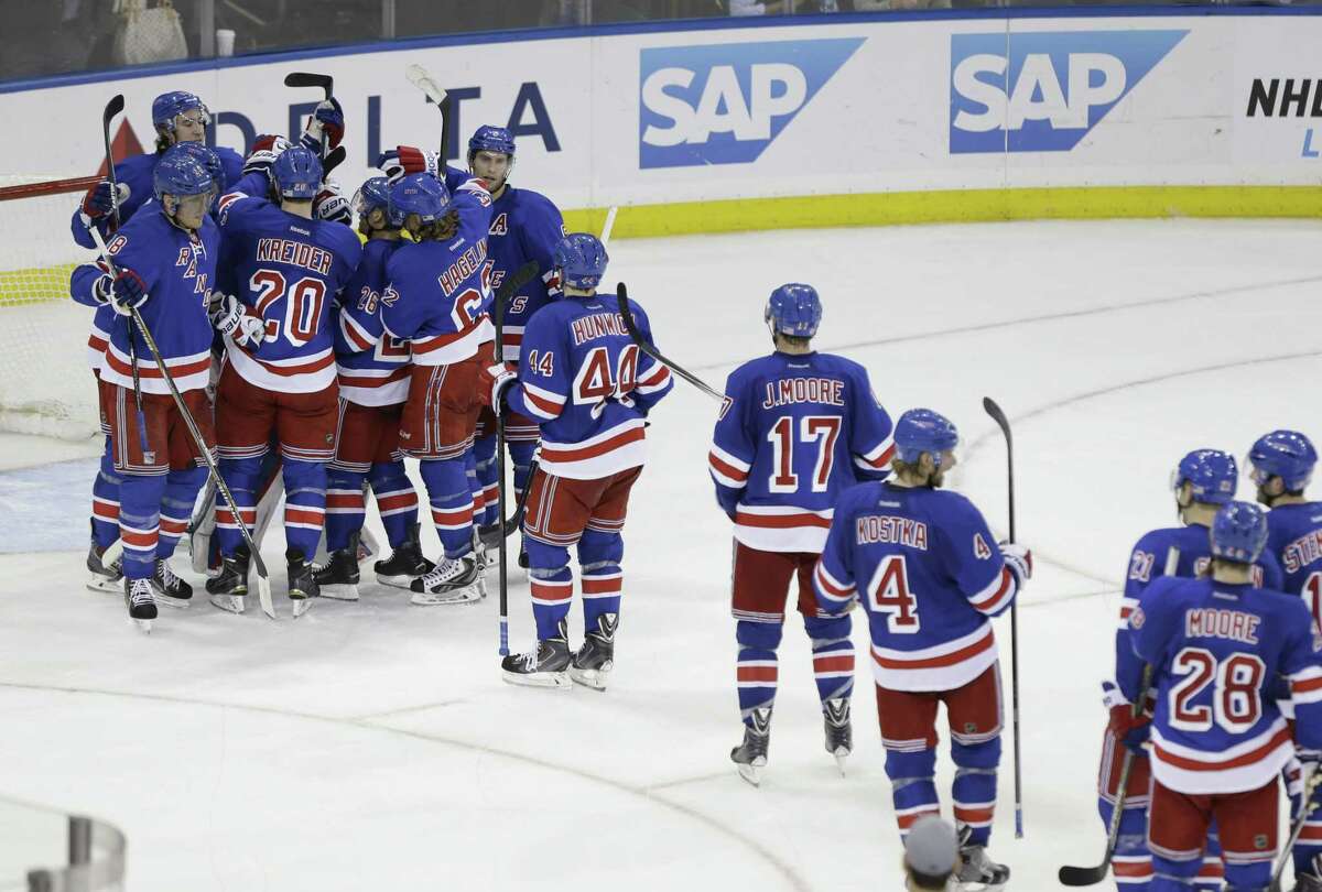 The Rangers celebrate after a 5-0 win over the Pittsburgh Penguins on Tuesday in New York.