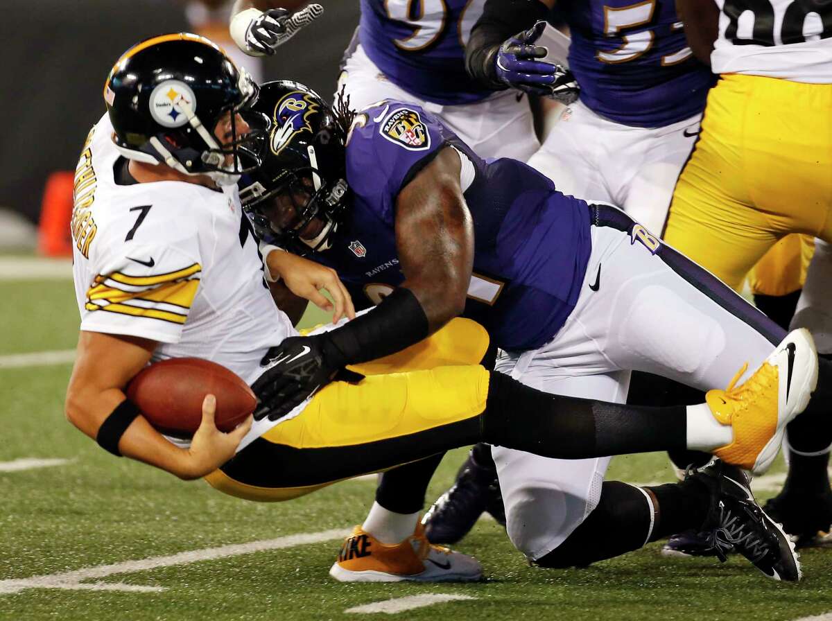 Steelers quarterback Ben Roethlisberger (7) is sacked by Ravens outside linebacker Courtney Upshaw during the first half Thursday.