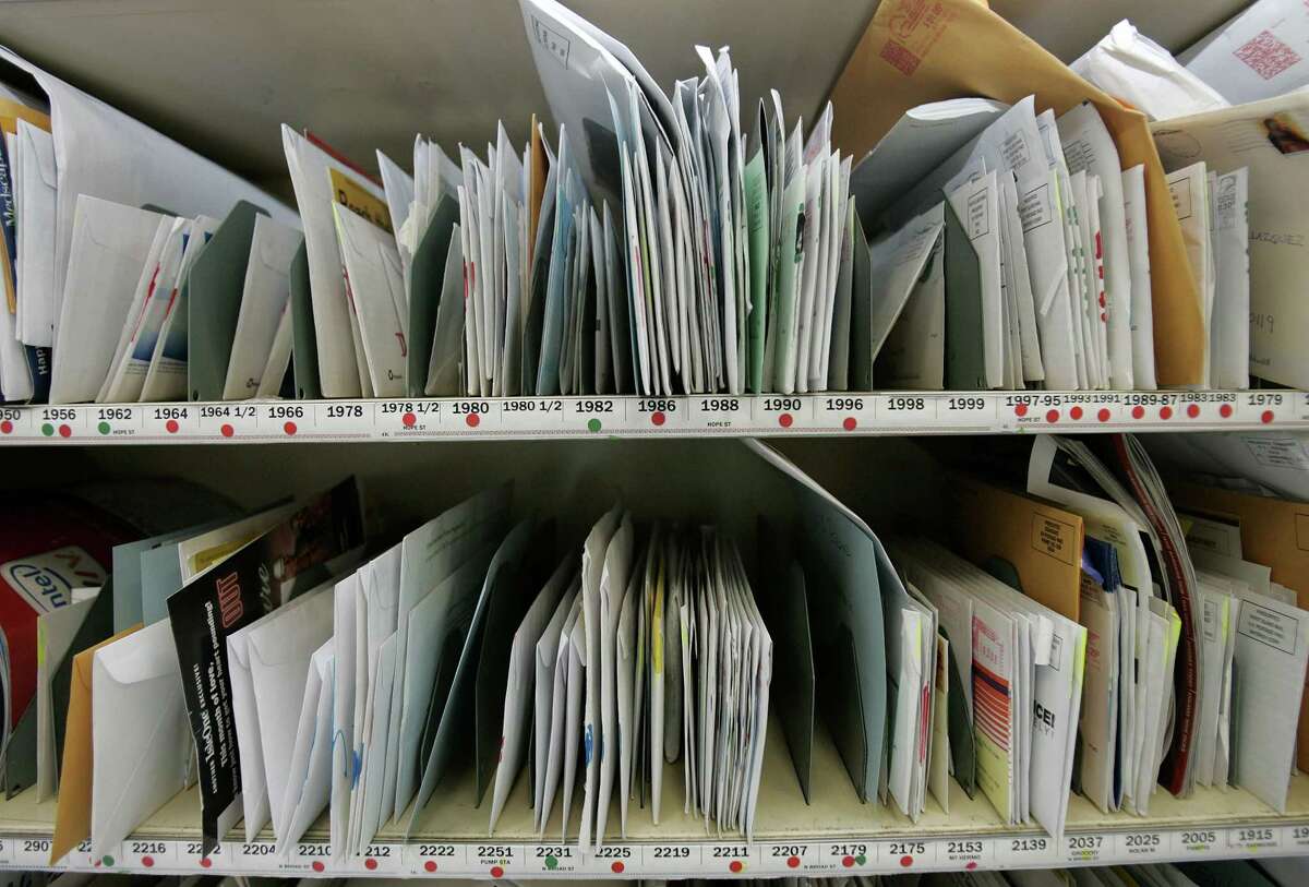 In this photo, mail is sorted and waits to be picked up at a New Orleans post office.