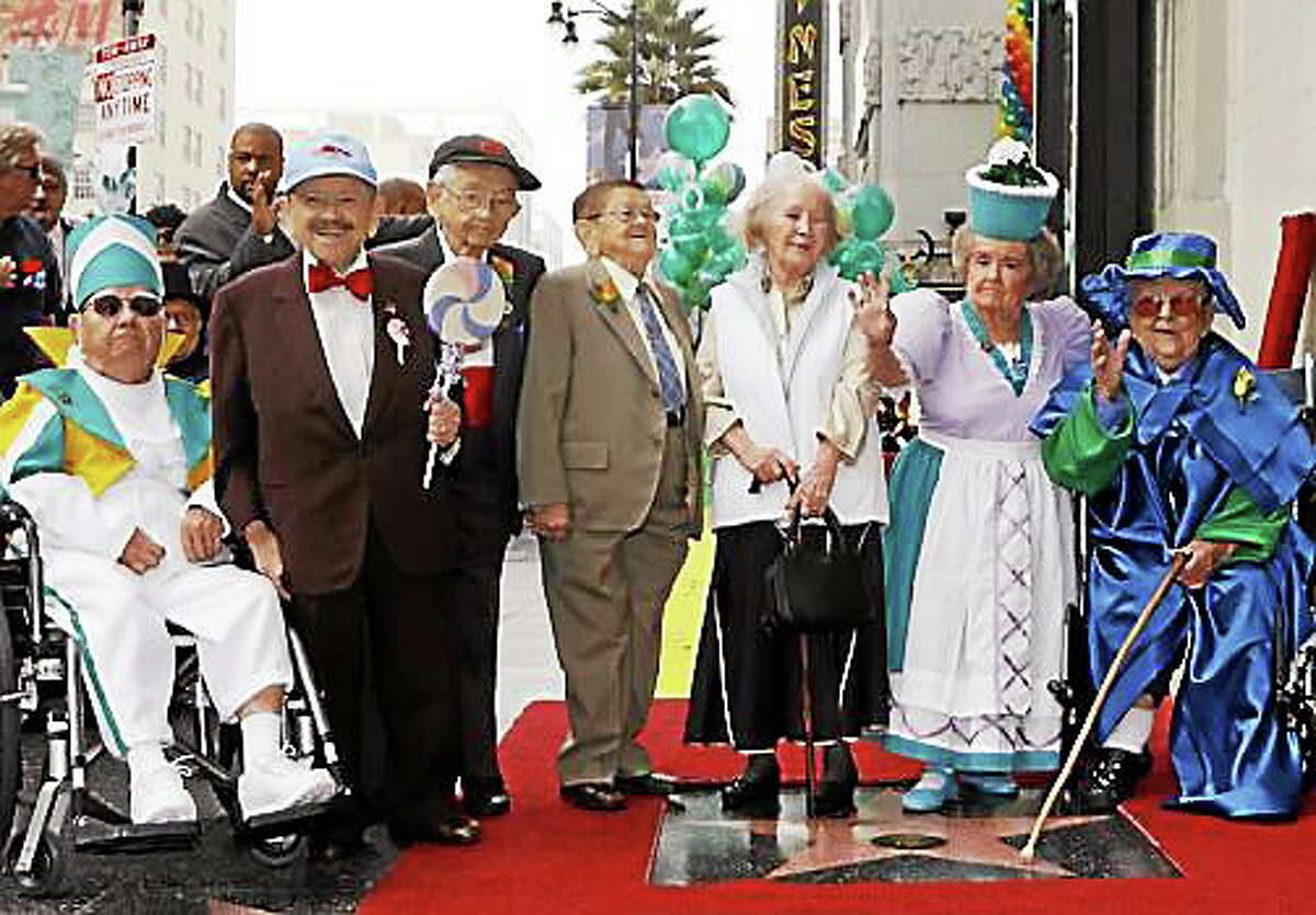 Munchkins gather to accept star on the Hollywood Walk of Fame. Mickey Carroll is third from left.