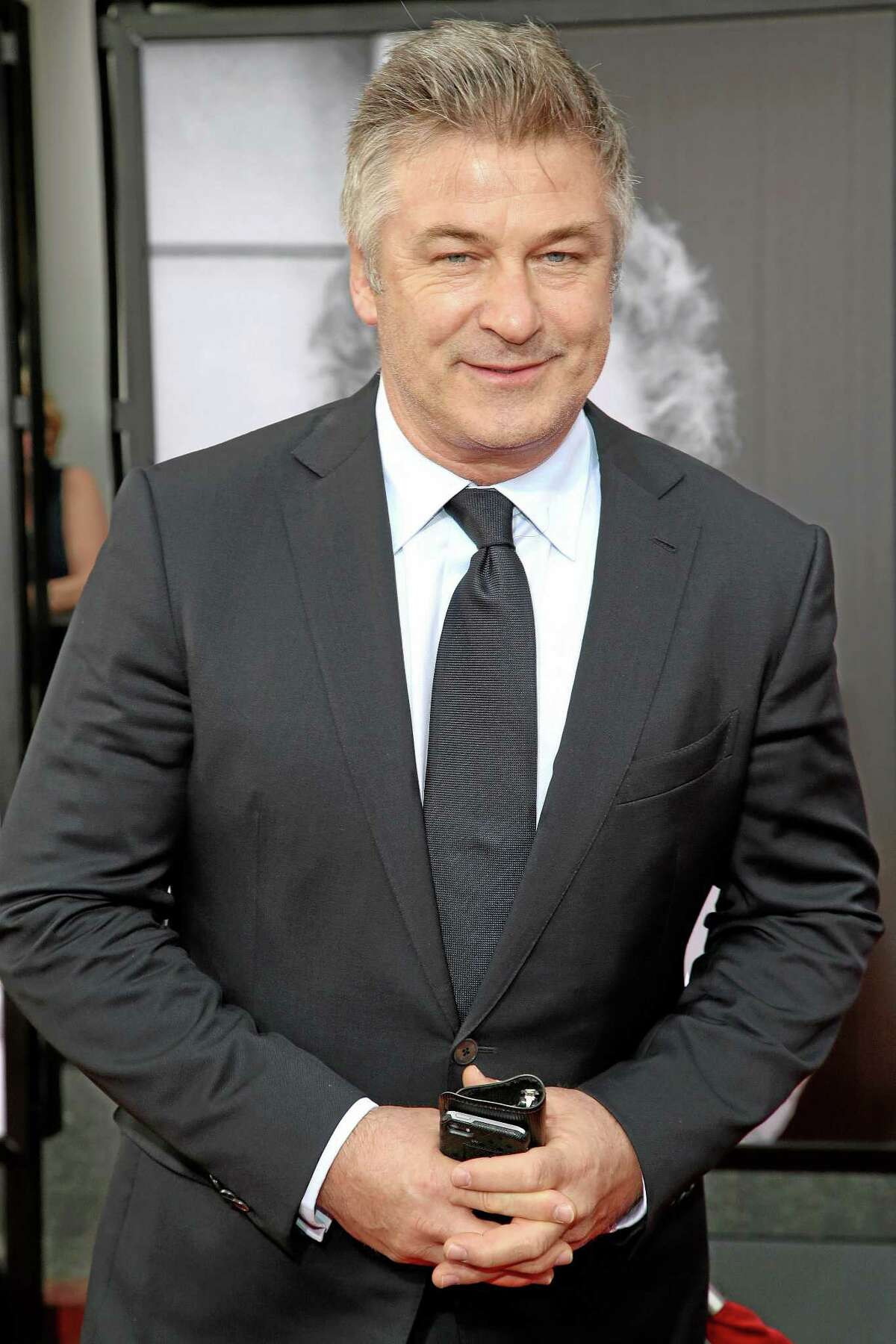 This April 10, 2014, file photo shows actor Alec Baldwin at the 2014 TCM Classic Film Festival’s Opening Night Gala in Los Angeles. Police in New York City say actor Alec Baldwin has been arrested for riding a bike the wrong way on the street and acting belligerently toward the arresting officers.