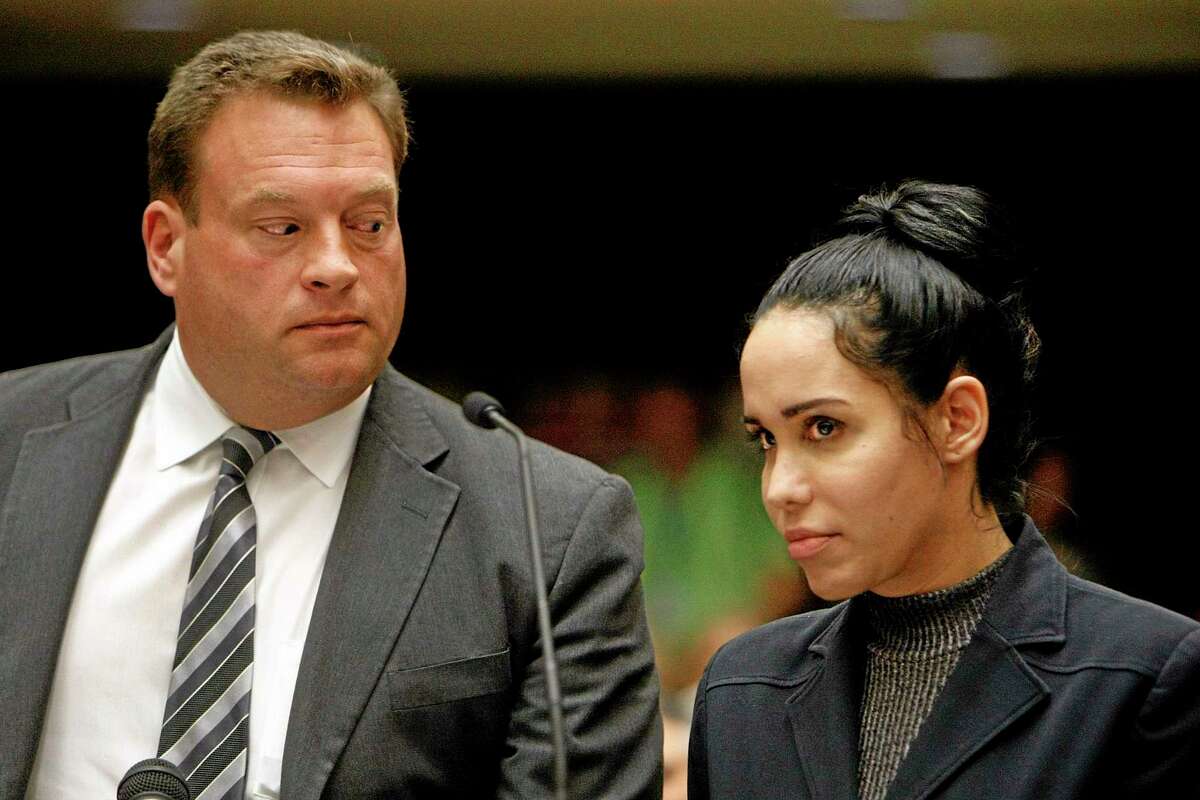 Nadya Suleman, right, appeares in a Los Angeles Superior courtroom with her attorney Arthur J. La Cilento Friday, Jan. 17, 2014. Suleman pleaded not guilty Friday to charges of failing to report $30,000 that authorities say she was earning when she applied for public assistance benefits. The 38-year-old single mother of 14 children was released on her own recognizance after her arraignment on three counts of welfare fraud. (AP Photo/Los Angeles Times, Al Seib) NO FORNS; NO SALES; MAGS OUT; ORANGE COUNTY REGISTER OUT; LOS ANGELES DAILY NEWS OUT; VENTURA COUNTY STAR OUT; INLAND VALLEY DAILY BULLETIN OUT; MANDATORY CREDIT, TV OUT