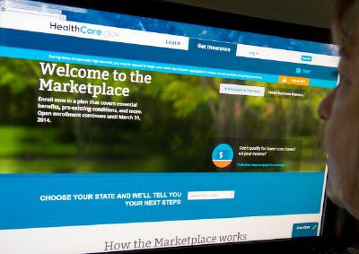 This December 2, 2013 photo shows a woman reading the HealthCare.gov insurance marketplace internet site in Washington, DC. The troubleshooter appointed by President Barack Obama to overhaul a bungled health care website rollout said Sunday that improvements had made a "night and day" difference in handling online traffic. The White House has admitted previously that the launch of Healthcare.gov, where people can sign up for health insurance, was a debacle and the Obama administration pledged that the vast majority of potential customers would be able to enroll online by the end of November. AFP PHOTO / Karen BLEIER (Photo credit should read KAREN BLEIER/AFP/Getty Images)