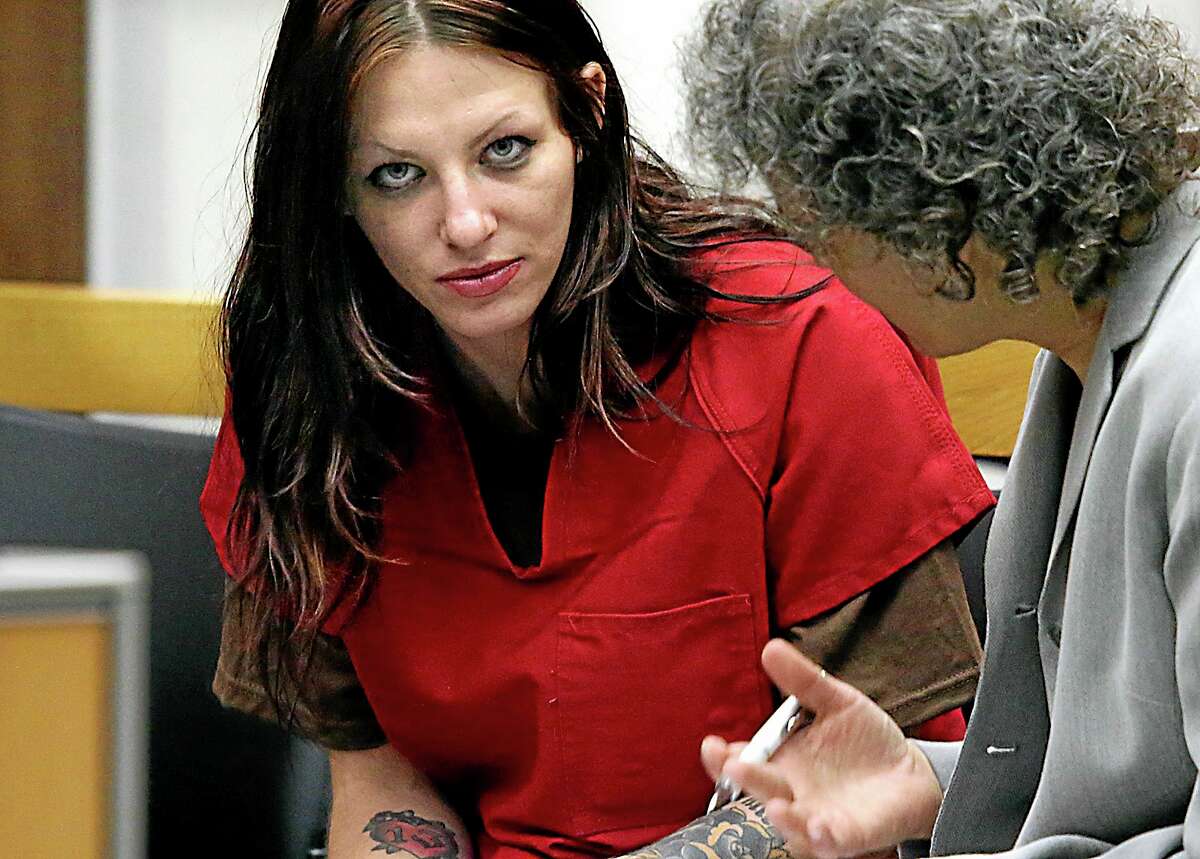 Alix Tichelman, left, 26, of Folsom, Calif., confers with public defender Diane August, right, during her arraignment in Santa Cruz Superior Court Wednesday, July 9, 2014, in Santa Cruz, Calif. Tichelman is facing manslaughter charges for the November 2013 death of Forrest Hayes, a Google executive. A Silicon Valley success story turned sordid this week with the arrest of an upscale prostitute who allegedly left Hayes dying on his yacht after shooting him up with a deadly hit of heroin. Hayes, 51, was found dead by the captain of his 50-foot yacht Escape. (AP Photo/Santa Cruz Sentinel, Shmuel Thaler)