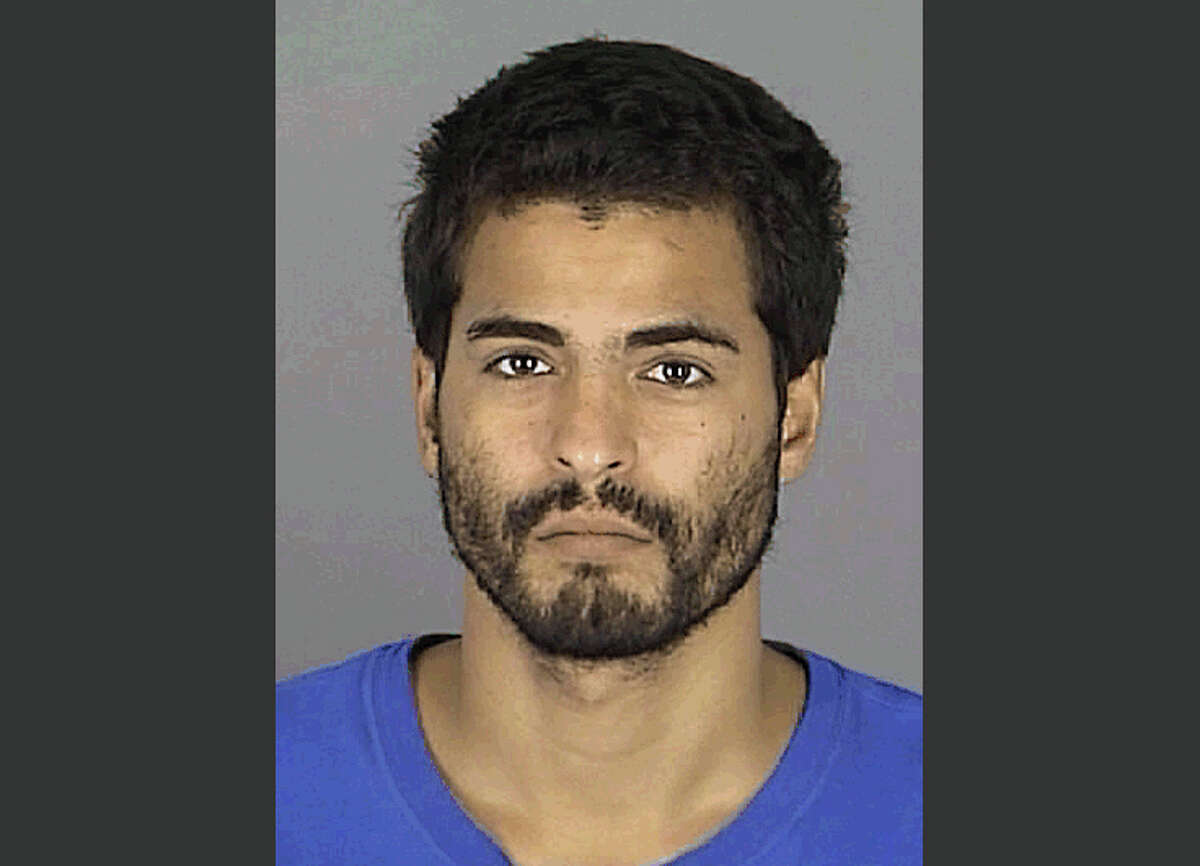 This photo provided by the Pasco County Sheriff's Office shows Adam Matos. Matos, 28, was arrested Friday, Sept. 5, 2014 outside a Tampa hotel as a suspect in the killings of four people whose bodies were found stacked on the ground and decomposing in a neighborhood some 45 miles away. (AP Photo/Pasco County Sheriff's Office)