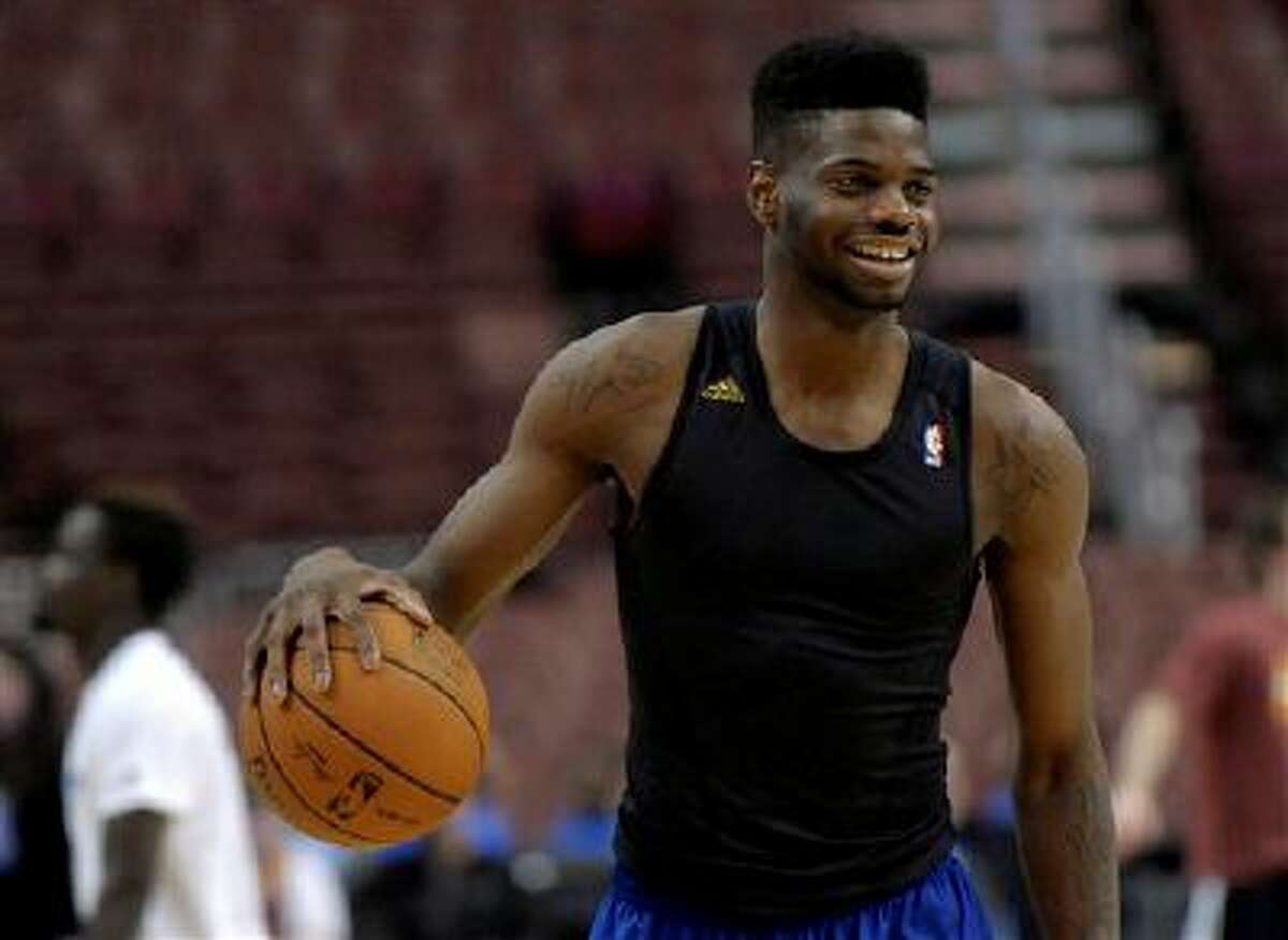 Philadelphia 76ers' Nerlens Noel is seen during an NBA basketball game against the Cleveland Cavaliers on Tuesday, Feb. 18, 2014, in Philadelphia. The Cavaliers beat the 76ers 114-85. (AP Photo/Michael Perez)