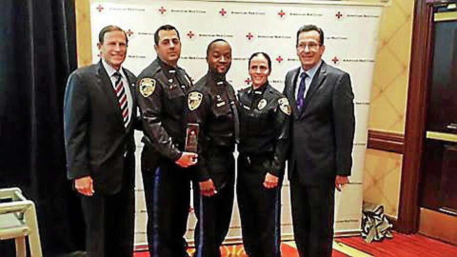 West Haven Police officers awarded for rescuing person from drowning ...