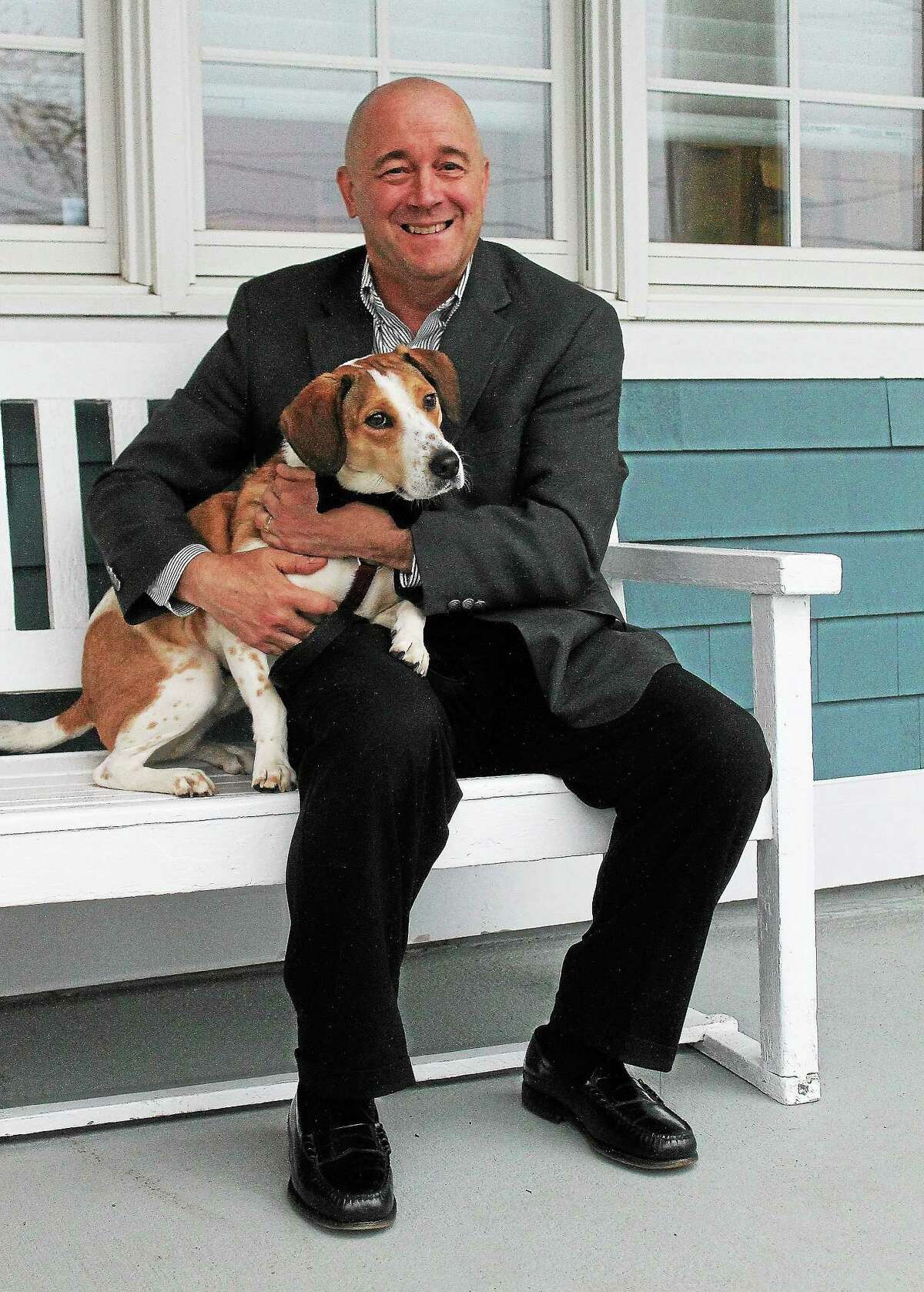 Daniel the beagle outside the Pine Orchard Yacht and Country Club with his owner, Joe Dwyer.