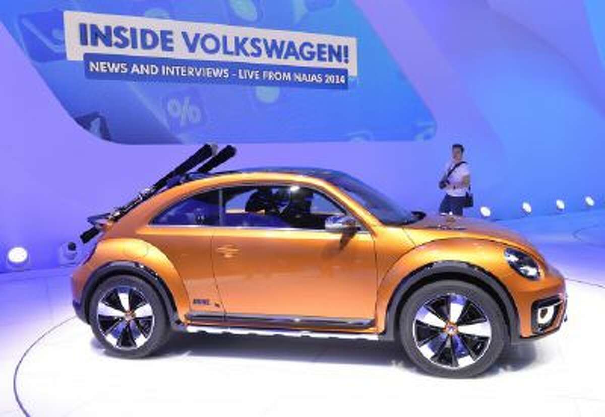 The Volkswagen Beetle Dune is presented during a press preview at the North American International Auto Show January 13, 2014 in Detroit, Michigan.