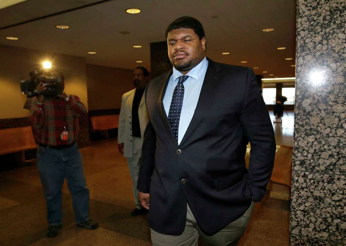 In this Jan. 17 file photo, Dallas Cowboys defensive tackle Josh Brent leaves a courtroom following a day in his trial for intoxication manslaughter in Dallas.