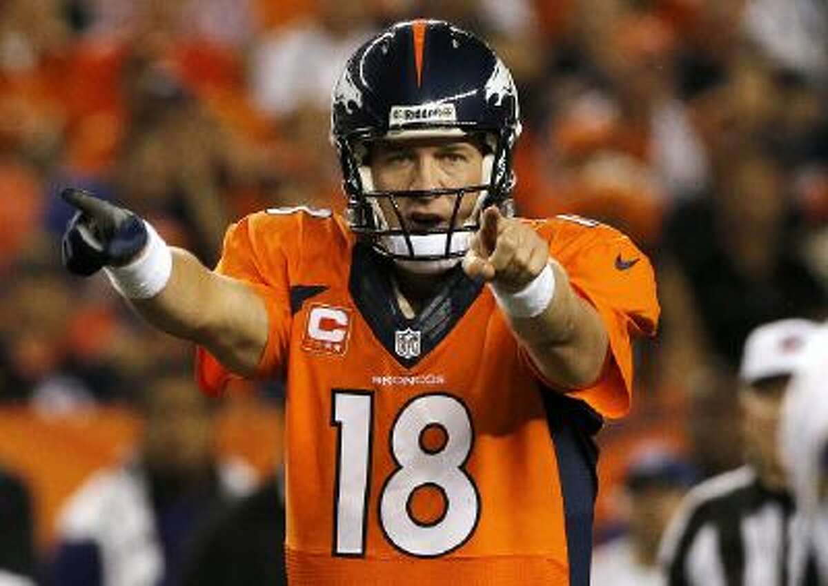 Midway through the fourth quarter of Sunday's game against Houston, Peyton Manning threw his 51st touchdown pass of the season, a new NFL record.