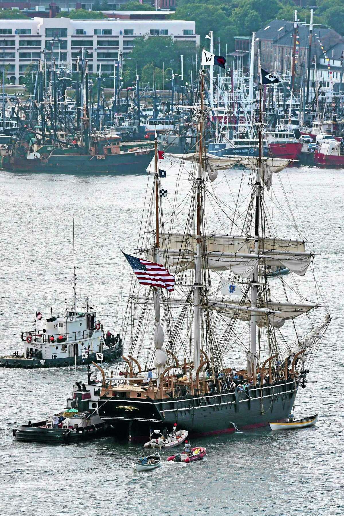 The whaleship Charles W. Morgan approaches its berth in New Bedford, Mass., Wednesday June 25, 2014. The Charles W. Morgan is the last surviving ship from America's 19th century whaling fleet and is three-month journey along the southern New England coast.(AP Photo/Standard Times, Peter Pereira)