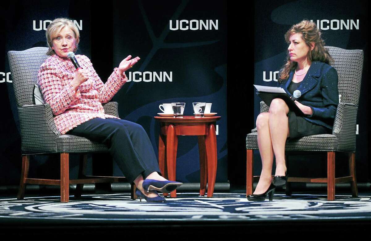 Former Secretary of State Hillary Clinton, left, answers questions read by University of Connecticut president Susan Herbst at the Edmund Fusco Contemporary Issues Forum at UCONN on April 23, 2014.