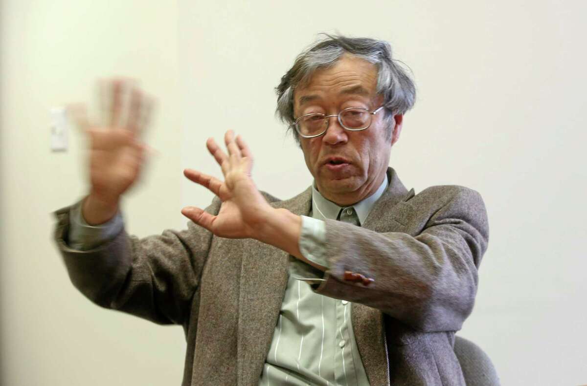 Dorian S. Nakamoto gestures during an interview with the Associated Press Thursday in Los Angeles.
