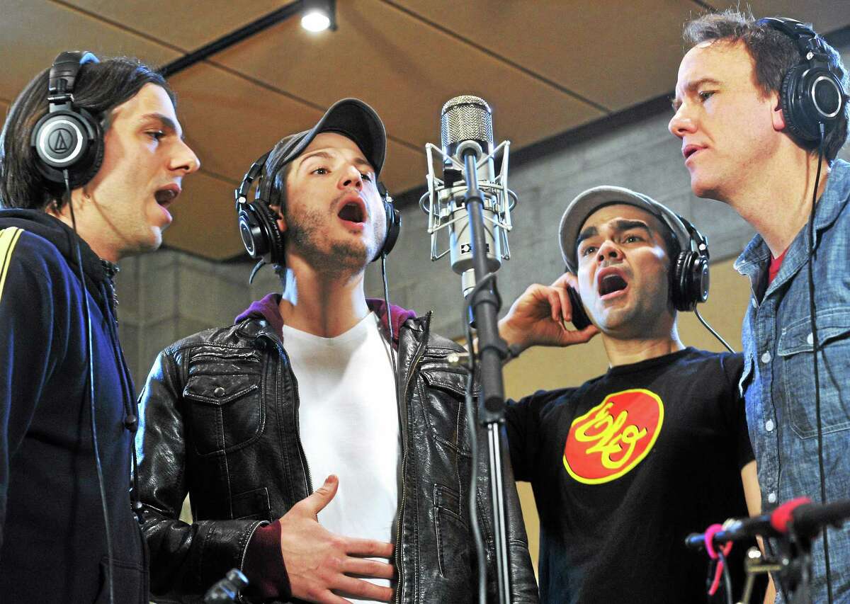 (Mara Lavitt ó New Haven Register) From left, "Paper Bullet" actors Lucas Papaelias, Bryan Fenkart, James Barry and David Wilson Barnes, rehearse a song for recording and use in the production this week.