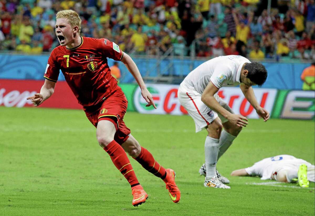 Belgium's Kevin De Bruyne celebrates after scoring the opening goal during the World Cup round of 16 soccer match between Belgium and the USA at the Arena Fonte Nova in Salvador, Brazil, Tuesday, July 1, 2014. (AP Photo/Matt Dunham)