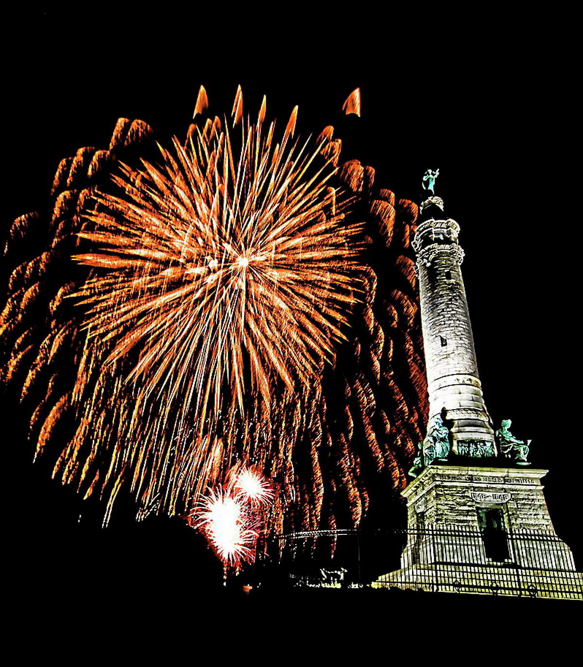 Fireworks light up the summit of East Rock Park in New Haven on the Fourth of July.