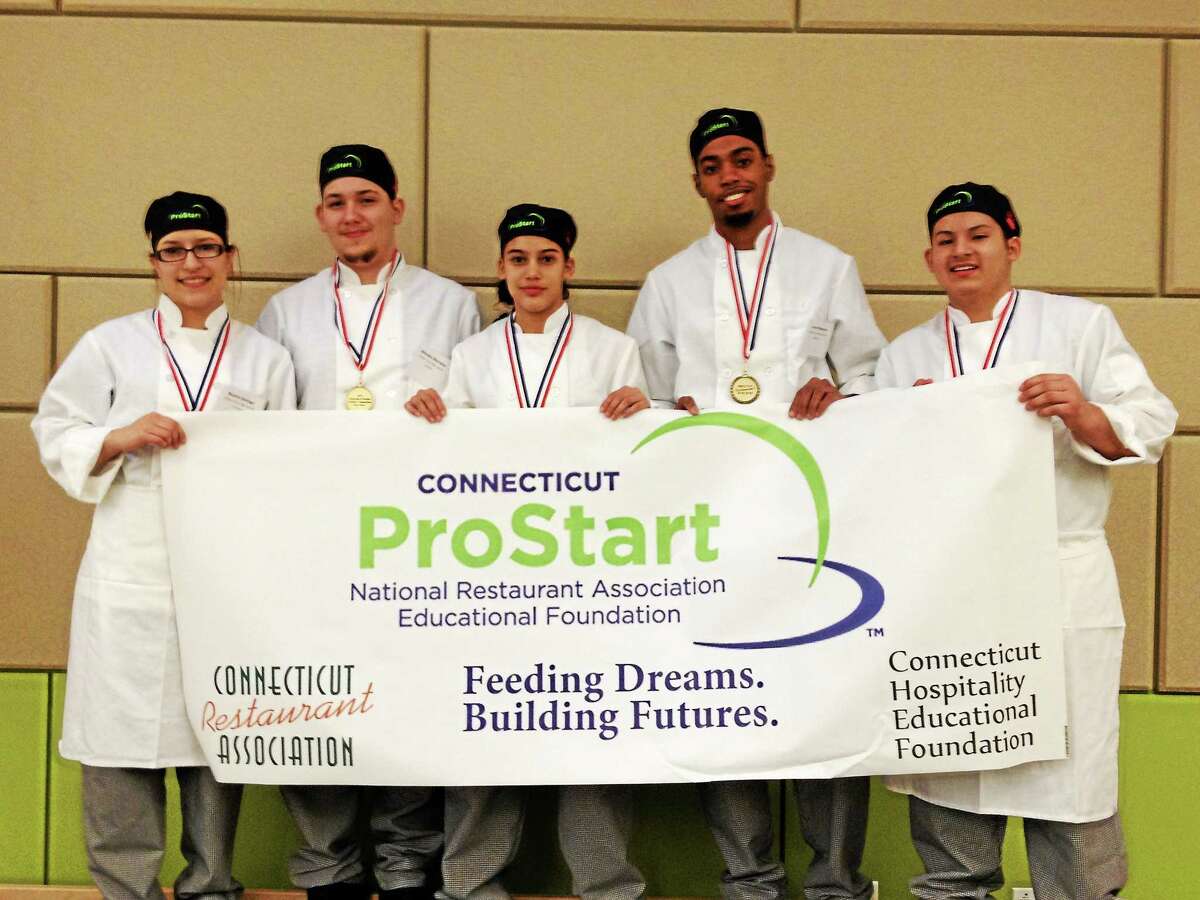 Five students from Wilbur Cross High School in New Haven will compete at a national culinary competition. From left are Neycha M. Santiago, Abimalec Montalvo, Alexia G. Velazuez, Javon T. Phelmett and Juan Carlos.