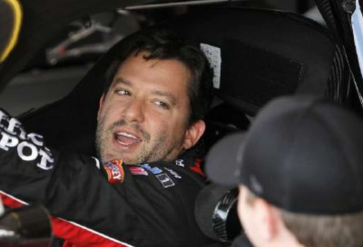 Driver Tony Stewart won't be cleared by doctors to drive a race car against until at least Feb. 14.