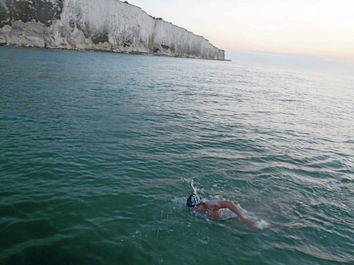 Dori Miller approaches the White Cliffs of Dover as she nears the completion of her two-way swim across the English Channel on Aug. 5.