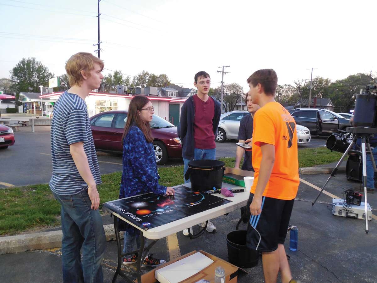 The EHS Science Club sets up demonstrations for Yuri’s Night at Annie’s Frozen Custard.