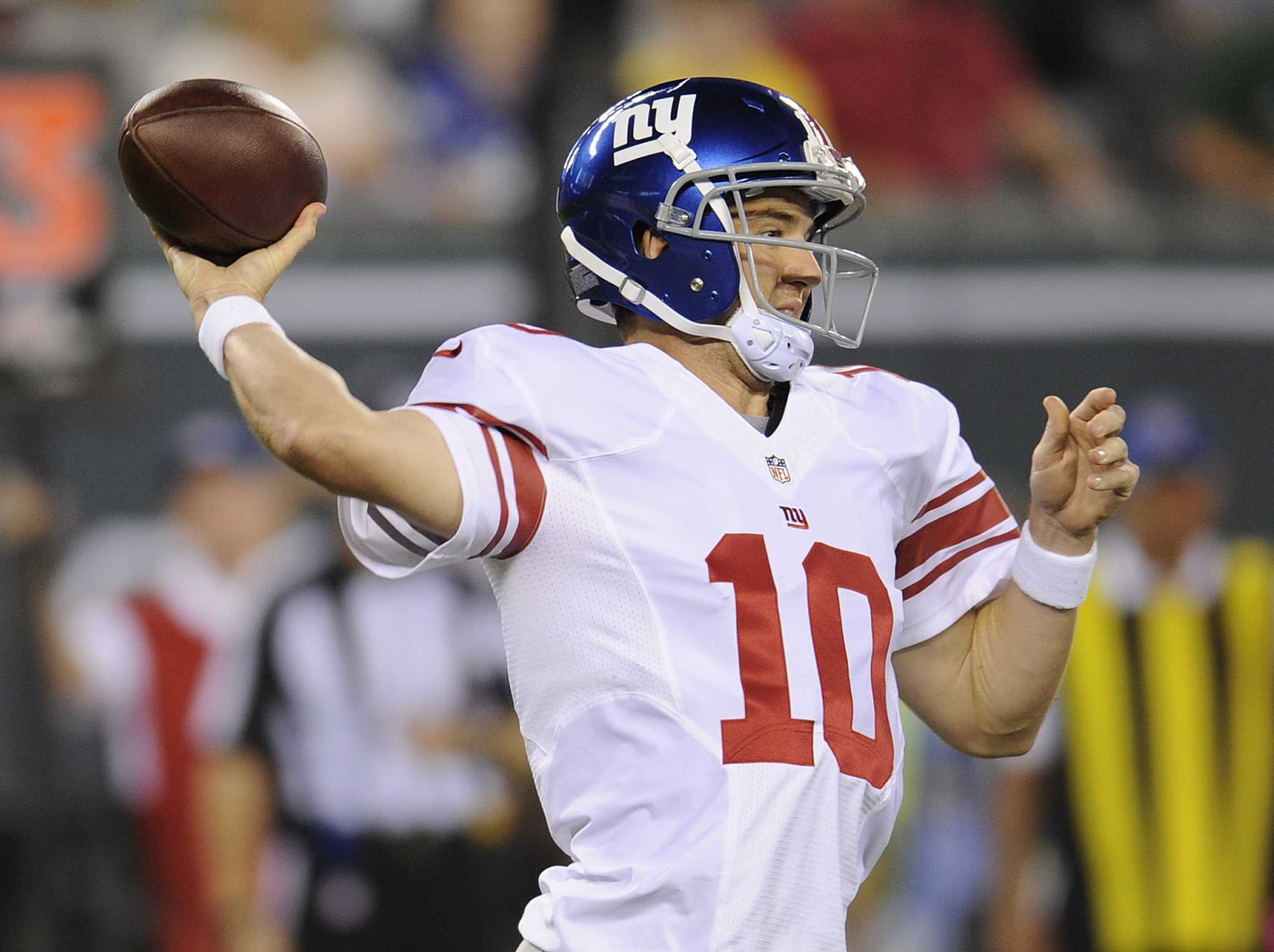 New York Giants quarterback Eli Manning releases a pass in the