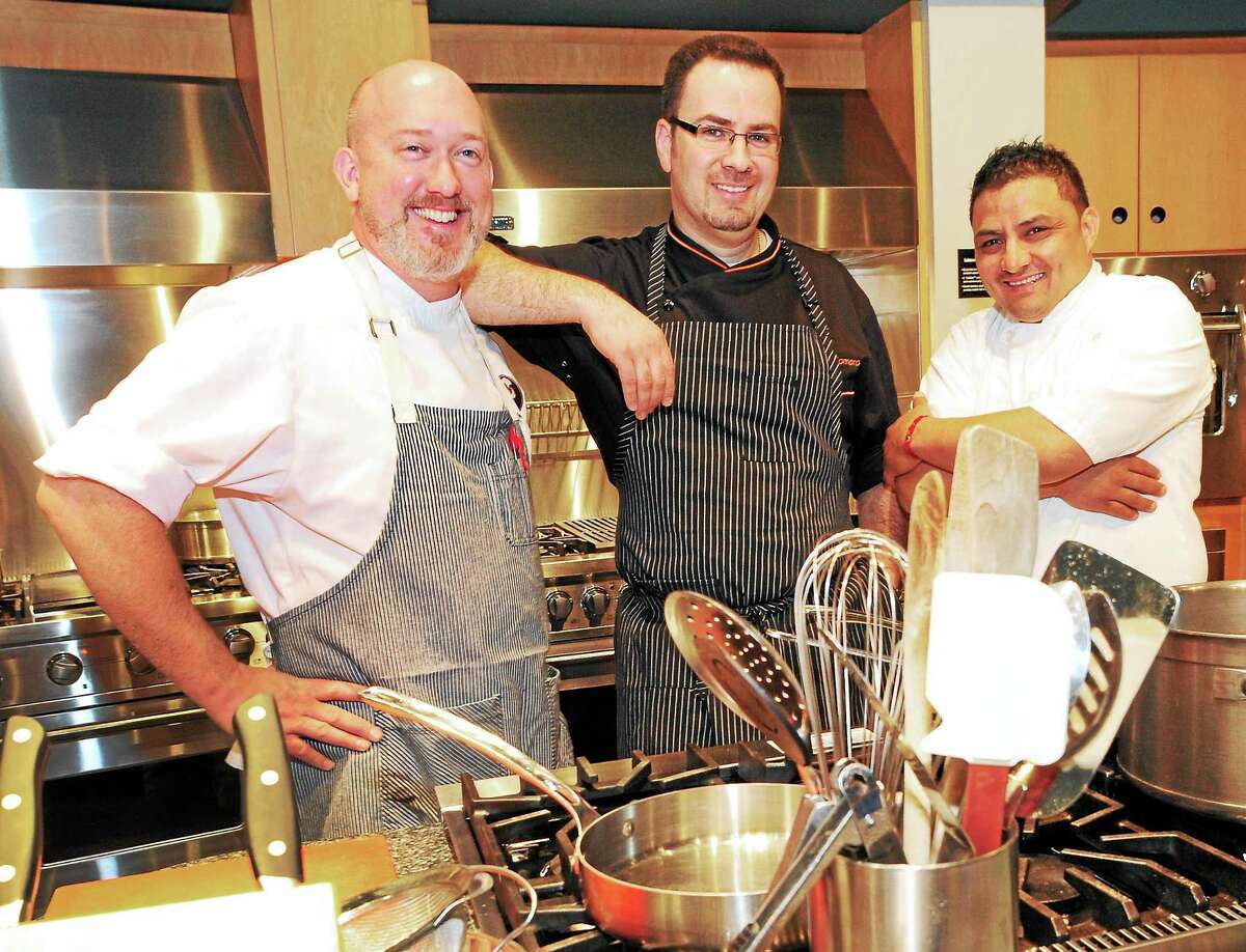 Frank Proto of Barcelona, left; Manuel Romero, formerly of Ibiza; and Alex Morales of Mambo Cocina Latina were the New Haven chefs competing in the seventh annual Iron Chef Elm City cooking competition Sunday.