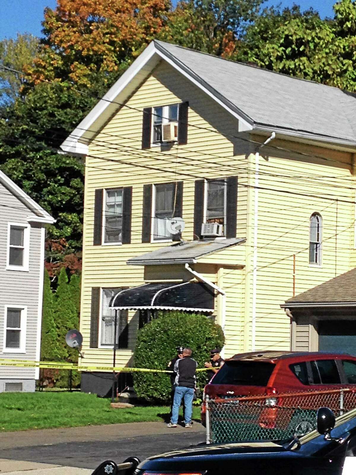 Police investigate a shooting at a home on Circular Avenue in Hamden Sunday.