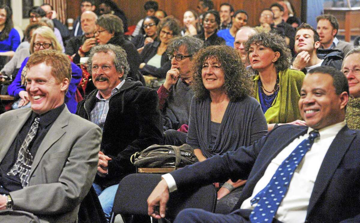 The audience reacts to comments made about J. Edgar Hoover, former head of the FBI, during a discussion Wednesday at Yale’s Sterling Memorial Library.