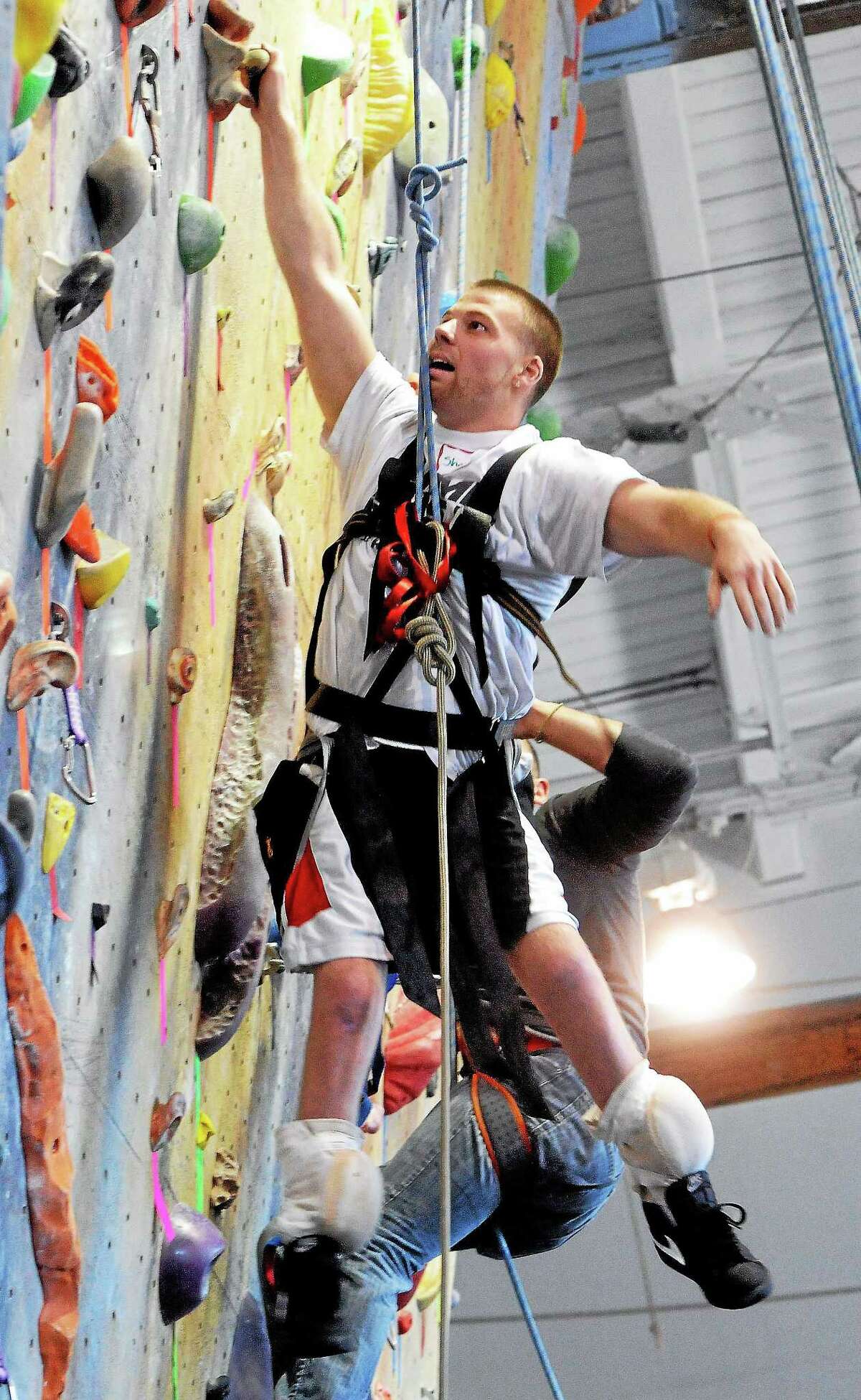 (Mara Lavitt ó New Haven Register) April 19, 2014 Wallingford The Gaylord Specialty Healthcare Sports Association, with the help of Nate McKenzie of Ascent Climbing and Paradox Sports, hosted an adaptive rock climbing clinic for those with physical disabilities or visual impairment, at Prime Climb in Wallingford. Shane Mosko of Southington during his climb. mlavitt@newhavenregister.com