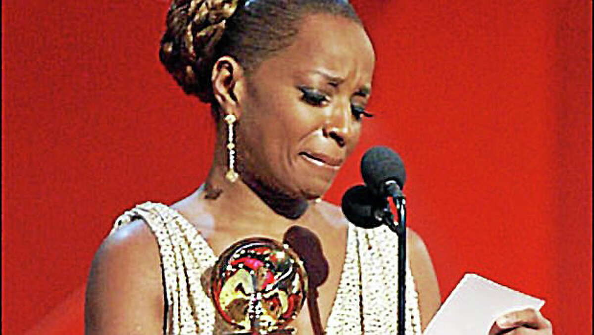 Mary J. Blige winning a Grammy for her album “The Breakthrough”