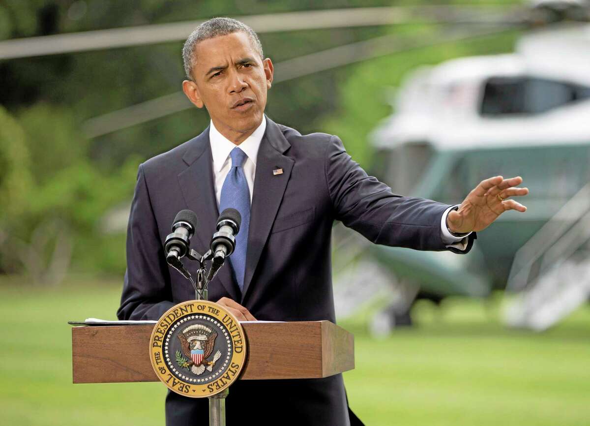 President Barack Obama talks about his administration’s response to a growing insurgency foothold in Iraq, Friday, June 13, 2014, on the South Lawn of the White House in Washington, prior to boarding the Marine One Helicopter for Andrews Air Force Base, Md., then onto North Dakota and California.