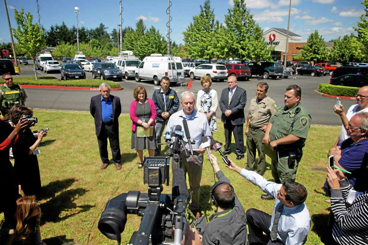 Troutdale Police Chief Scott Anderson speaks during a news conference in a Safeway parking lot near Reynolds High School on Tuesday, June 10, 2014, in Troutdale, Ore. A gunman killed a student at the high school east of Portland on Tuesday and the shooter is also dead, police said.