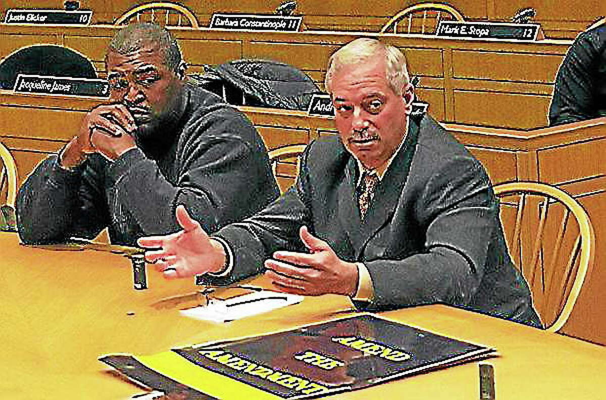 Fire union President Lt. James Kottage, right, sits next to Firebirds Society President Mike Neal at a 2013 Finance Committee meeting.