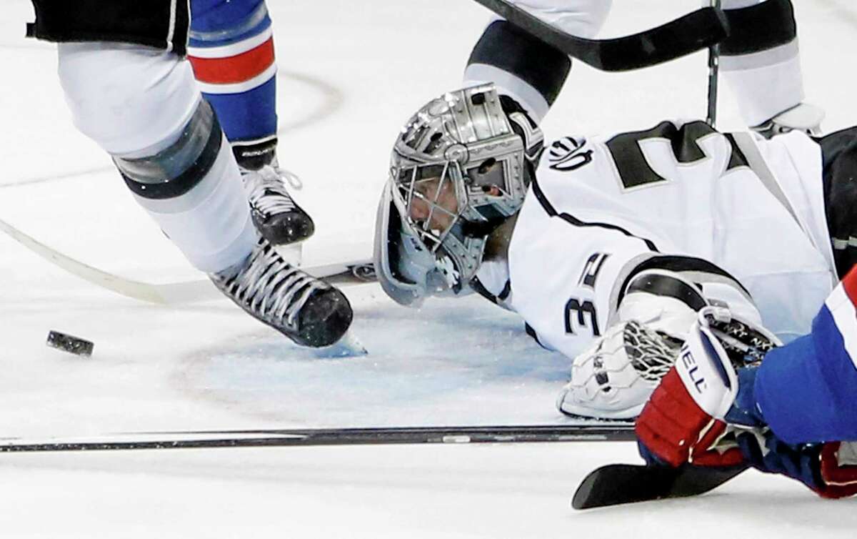 Los Angeles Kings goalie Jonathan Quick follows the rebound after blocking a shot against the New York Rangers in the second period Monday.