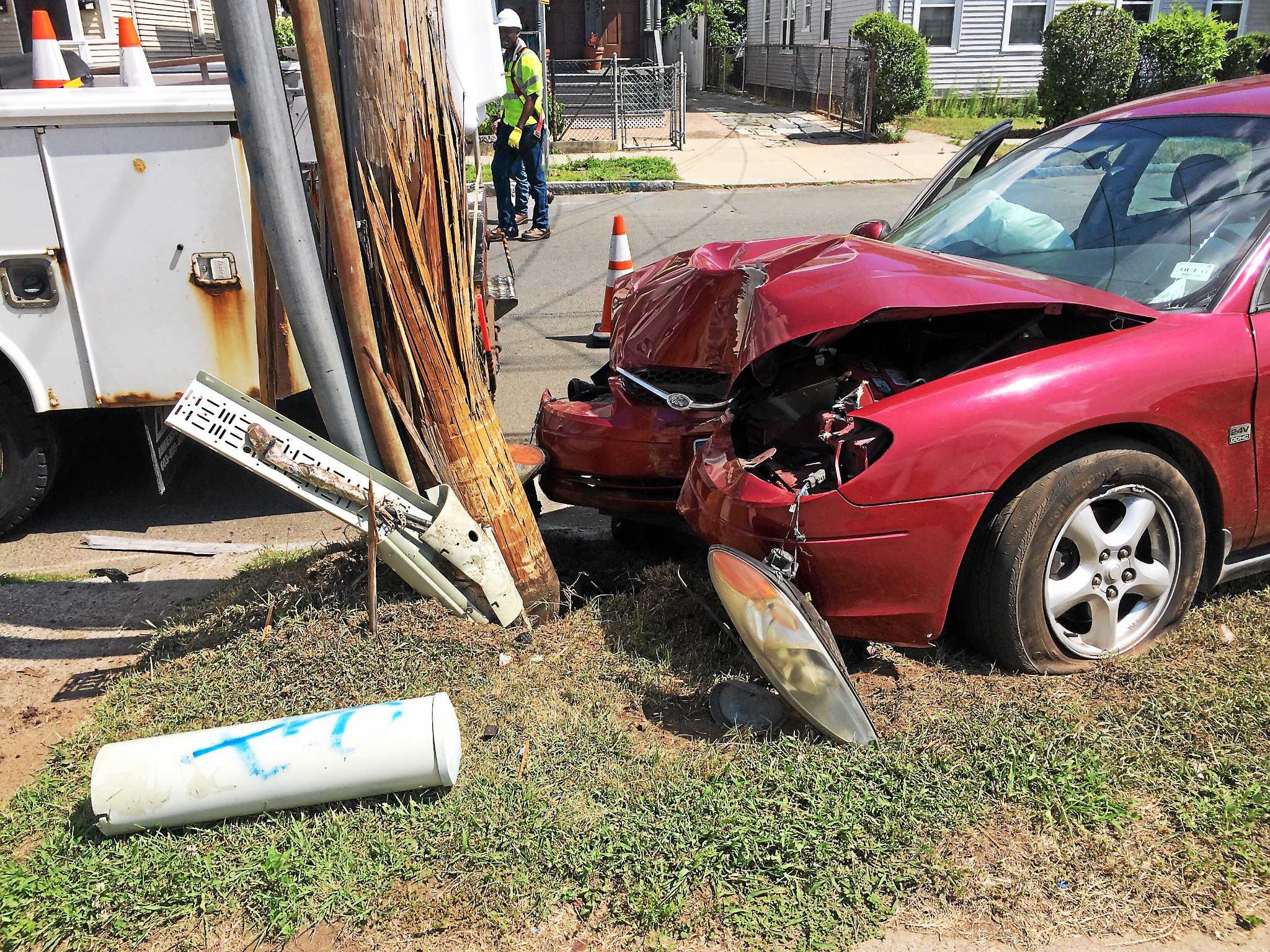 Driver hurt after car crashes into utility pole in New Haven