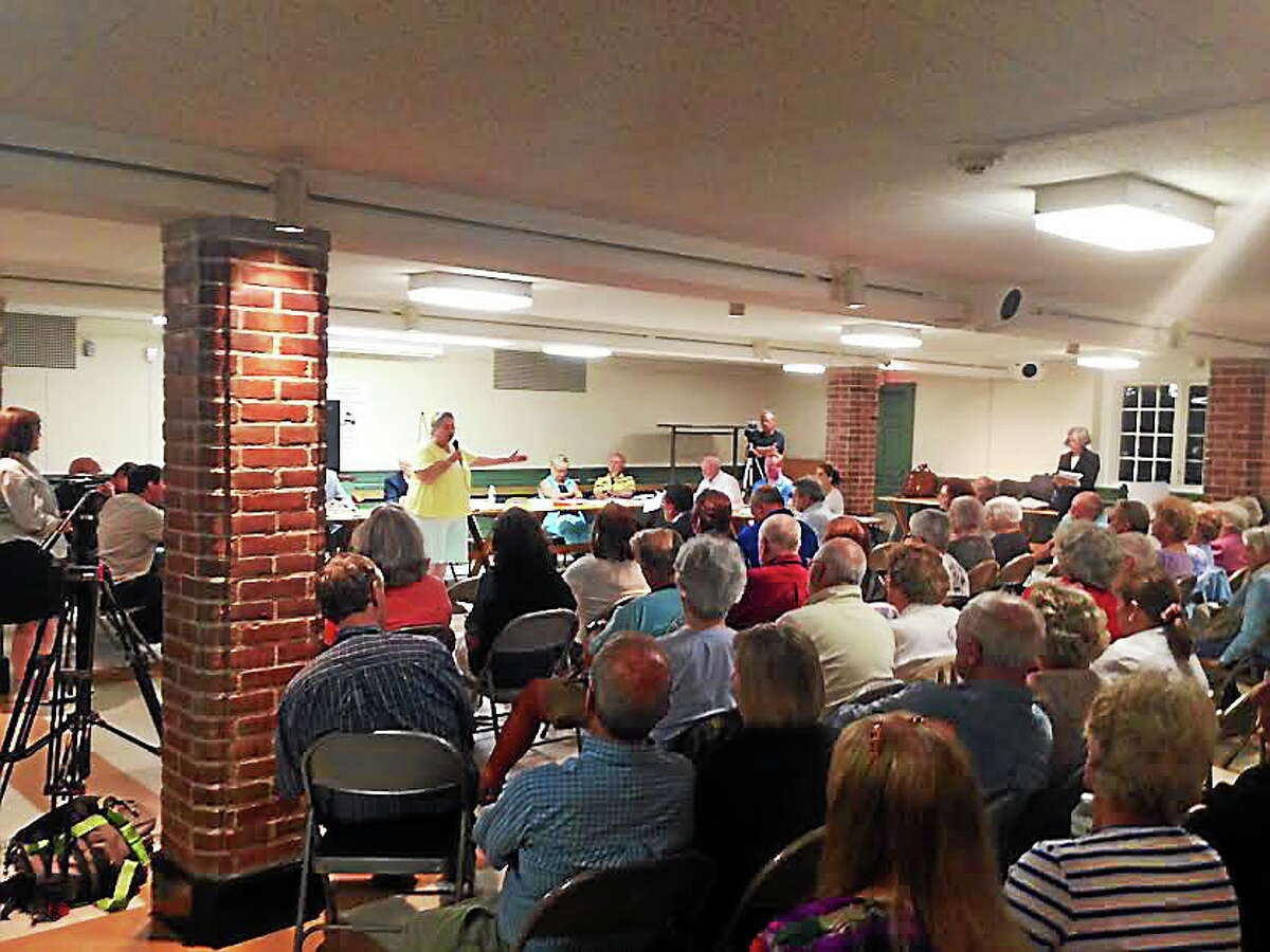 Over 100 people showed up for Monday night's meeting at Andrews Memorial Town Hall. Sean Carlin/New Haven Register