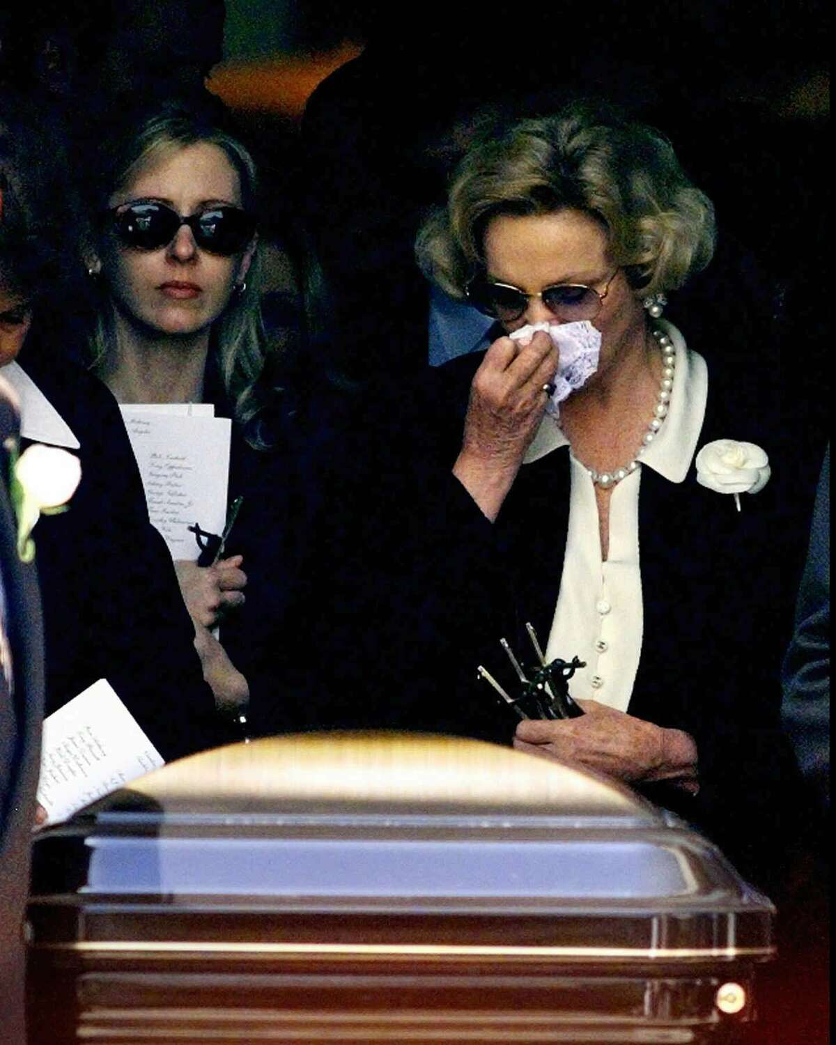 Barbara Sinatra, right, wife of the late entertainer Frank Sinatra follows his the coffin after a funeral service at the Church of the Good Shepherd in Beverly Hills, Calif., Wednesday, May 20, 1998.