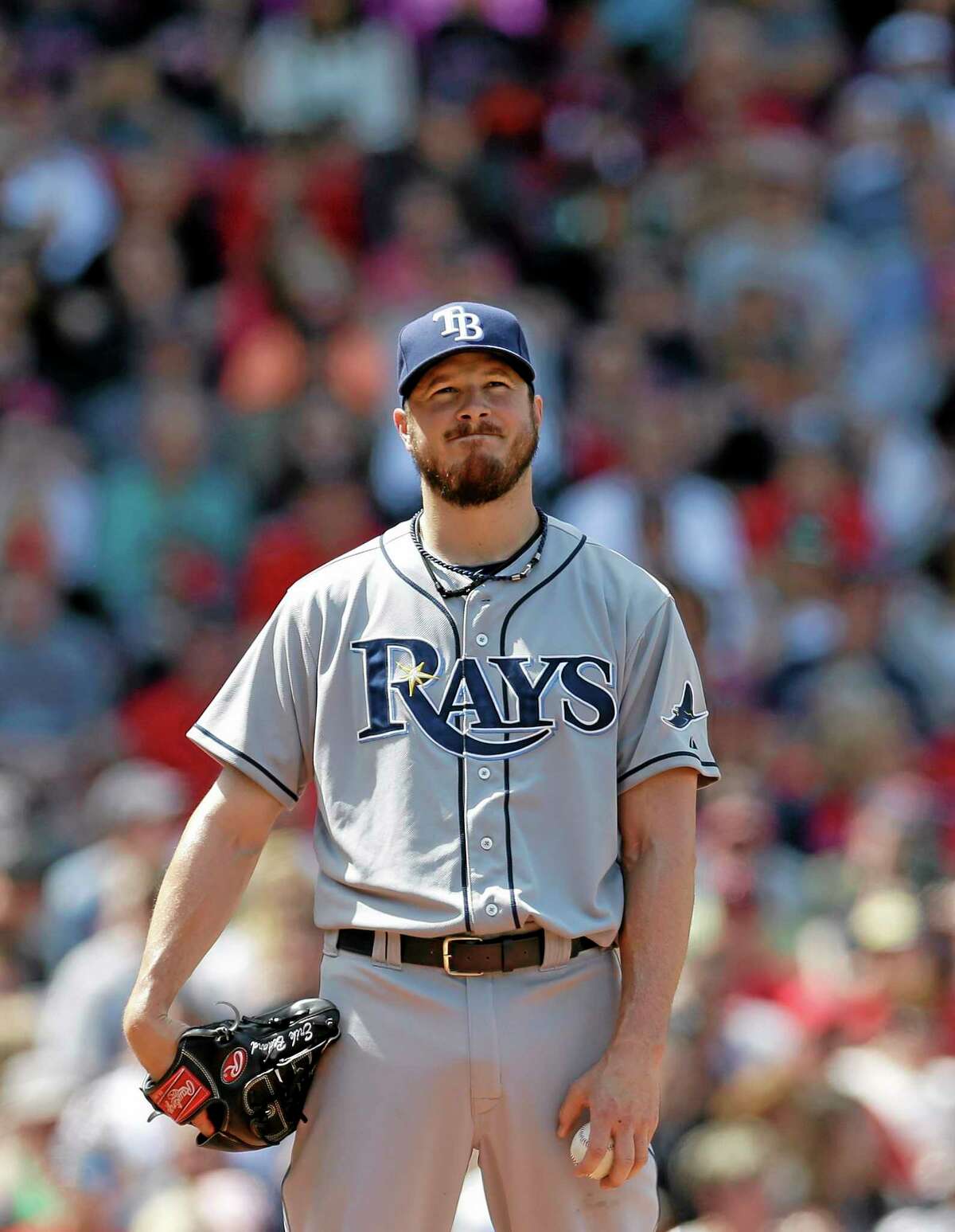 Tampa Bay Rays pitcher Erik Bedard grimaces as he looks up from the mound after giving up runs to the Boston Red Sox in the fourth inning Sunday.