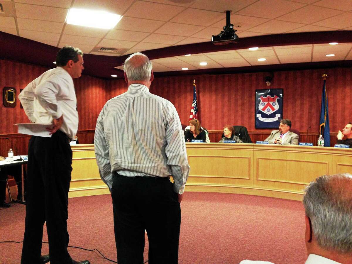 Superintendent Scott Schoonmaker, left, and Personnel/Business Director Don Winnicki address the North Branford Town Council Tuesday night.