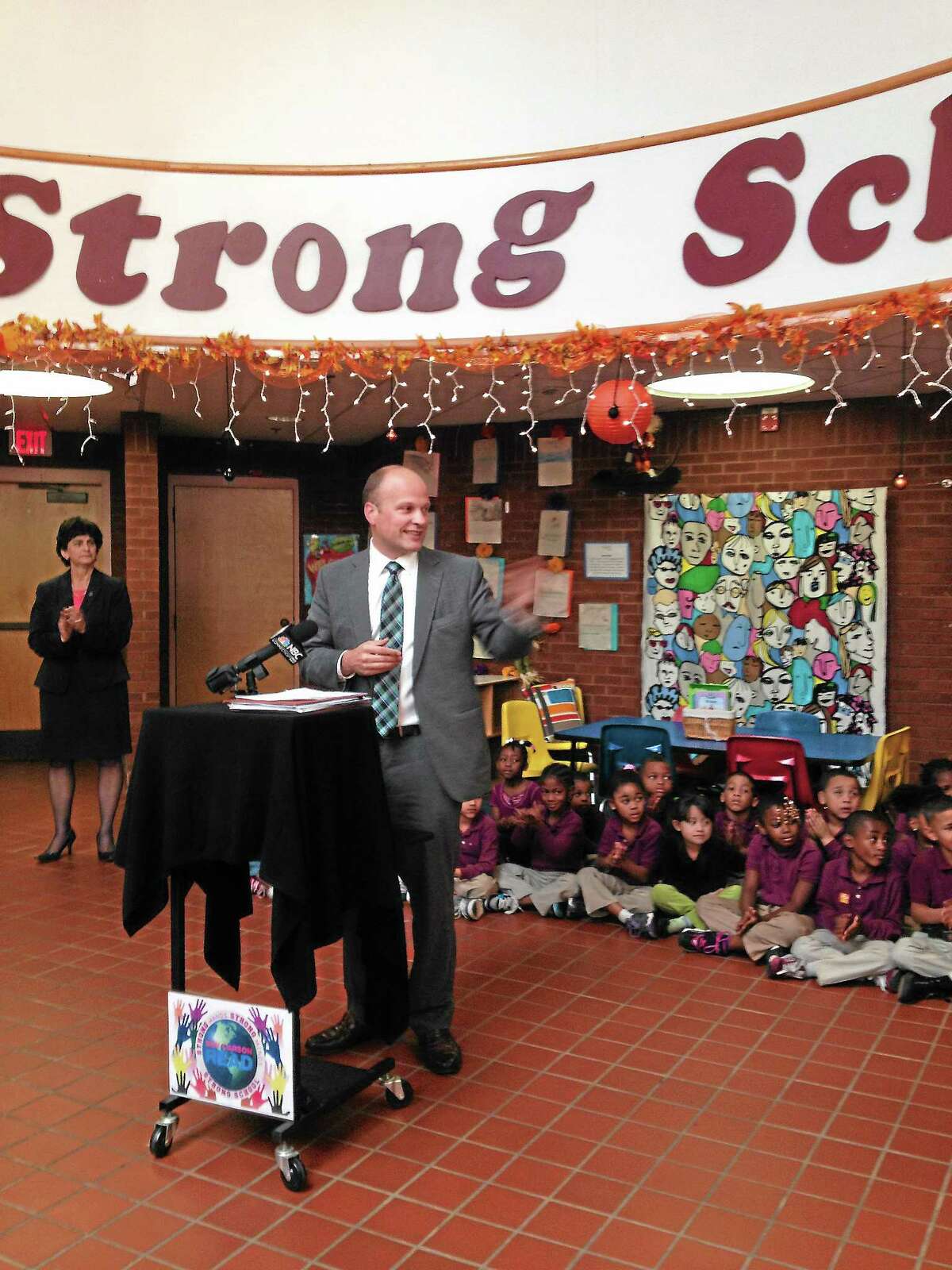 Superintendent of Schools Garth Harries speaks at a September event at New Haven's Strong School