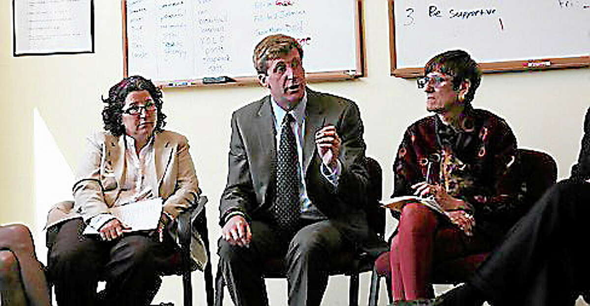 Healthcare Advocate Victoria Veltri, former U.S. Rep. Patrick Kennedy, and U.S. Rep. Rosa Delauro in April at the Clifford Beeres Clinic in New Haven.