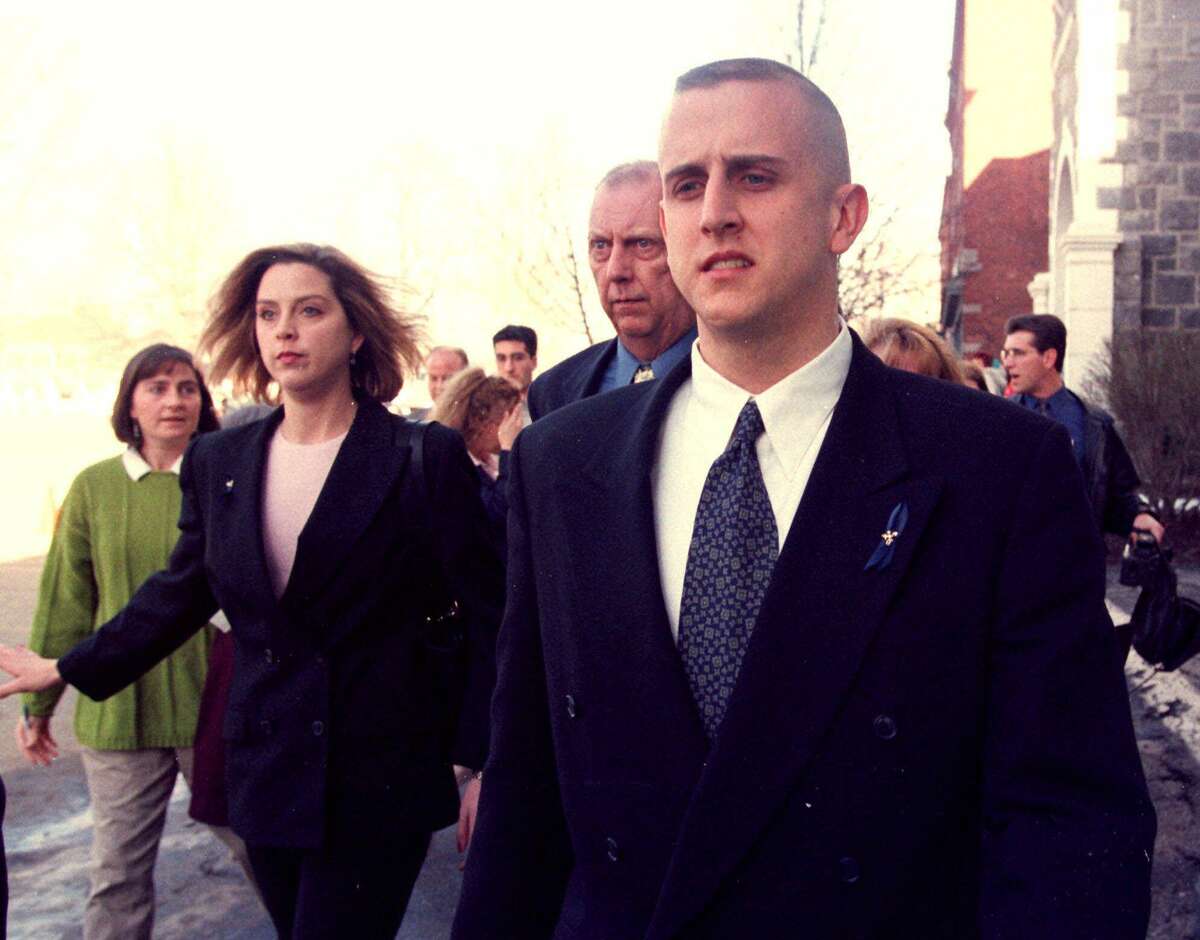 New Milford, Conn., police officer Scott Smith leaves Superior Court in Litchfield, Conn., Wednesday, March 17, 1999, after a judge ruled that prosecutors may proceed with a murder charge against him. Smith is charged with murder in connection with the Dec. 29, 1998 shooting death of Franklyn Reid in New Milford. (AP Photo/Bob Child)